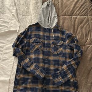 Vans flannel with hoody and pockets. Worn once size small